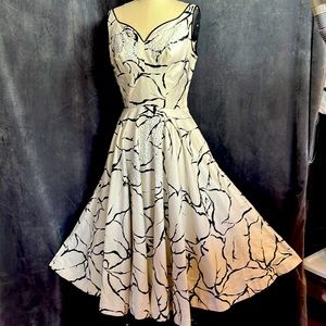 1960s size 4 -6 black and white w sequins Authentic vintage dress. Bust 36 W 28